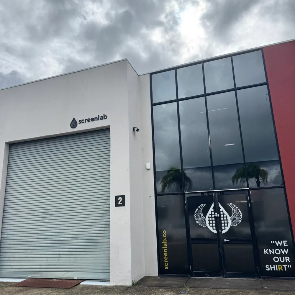 Screenlab's Gold Coast premises in Nerang, with WE KNOW OUR SHIRT on the door